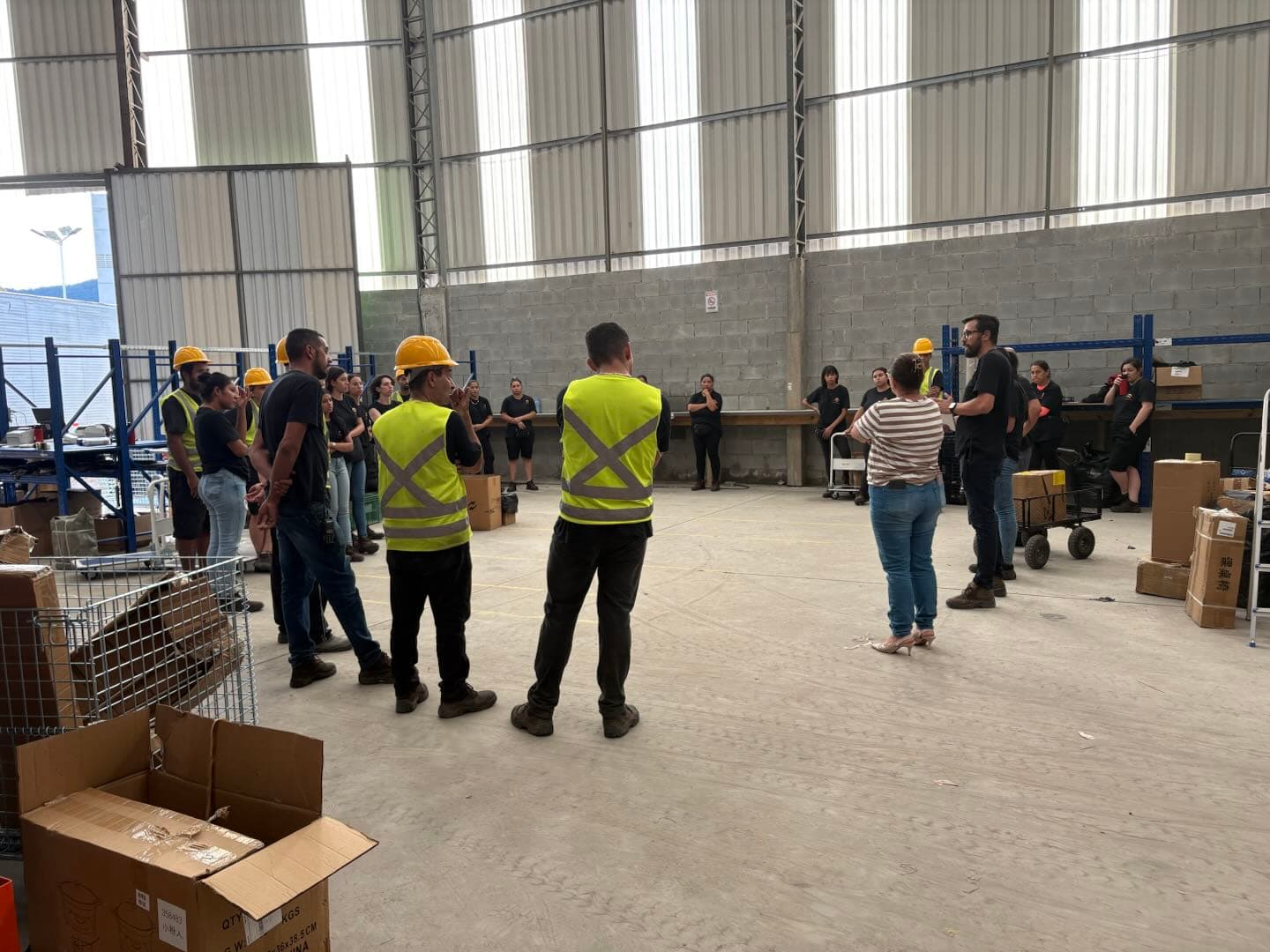 Team gathered for a briefing on an operating floor